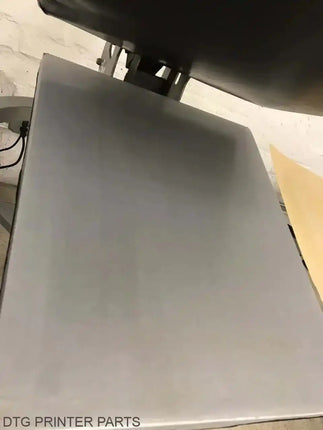 Rapid Slip Lower Platen Protector 11x15 shield with rounded corners mounted under a printer platen; black hinge visible.