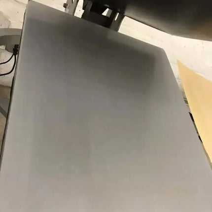 Rapid Slip Lower Platen Protector 15x15 gray rectangular shield with smooth surface, rounded corner, mounted beneath roller